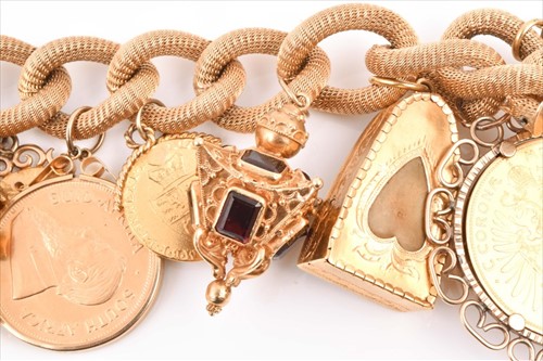 Lot 488 - A fine and impressive yellow gold charm...