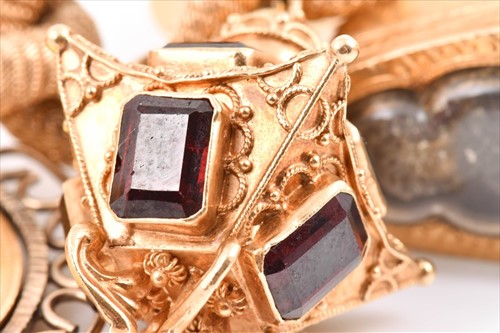 Lot 488 - A fine and impressive yellow gold charm...