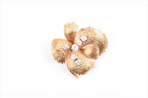 Lot 611 - A yellow metal and diamond foliate brooch the...