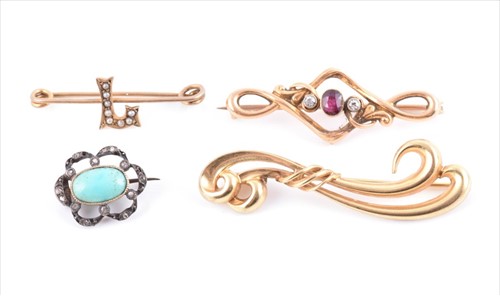 Lot 509 - A group of brooches including a yellow metal...