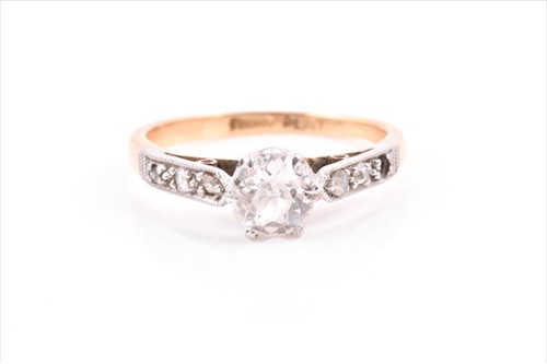 Lot 604 - An 18ct yellow gold, platinum, and diamond...