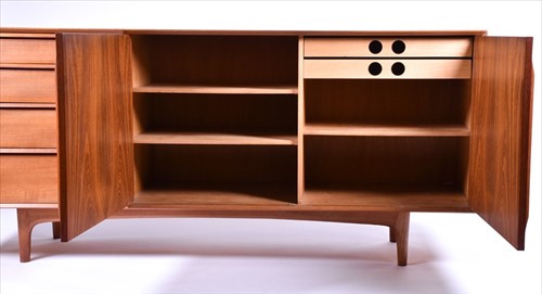 Lot 37 - A 1970s teak G-Plan style sideboard with two...