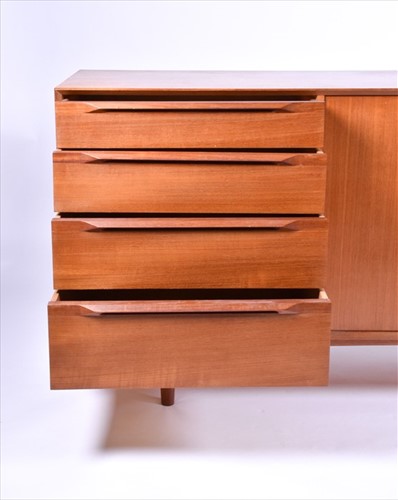 Lot 37 - A 1970s teak G-Plan style sideboard with two...