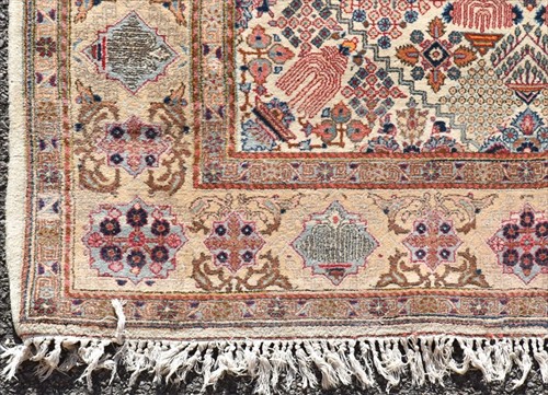 Lot 72 - A hand woven Persian Tabriz style rug of...