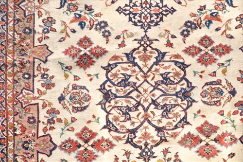 Lot 73 - A large Persian Tabriz style carpet with...