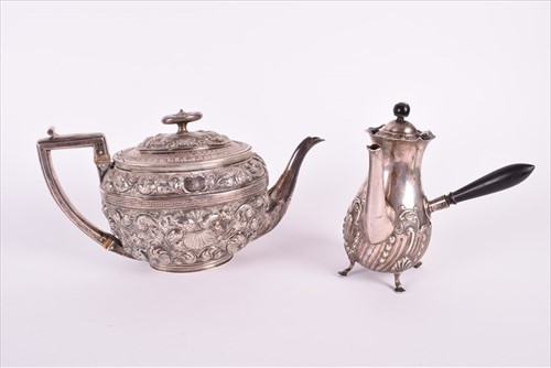 Lot 466 - A Georgian silver teapotÂ with later embossed...
