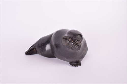 Lot 262 - A mid to late 20th century Inuit soapstone...