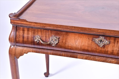 Lot 5 - A Georgian mahogany veneer silver table the...