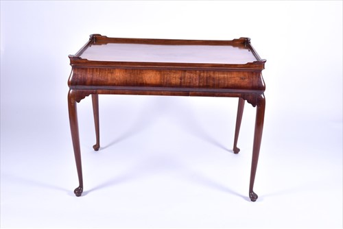 Lot 5 - A Georgian mahogany veneer silver table the...