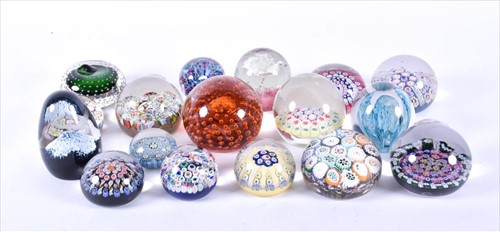 Lot 268 - A collection of glass paperweights to include...