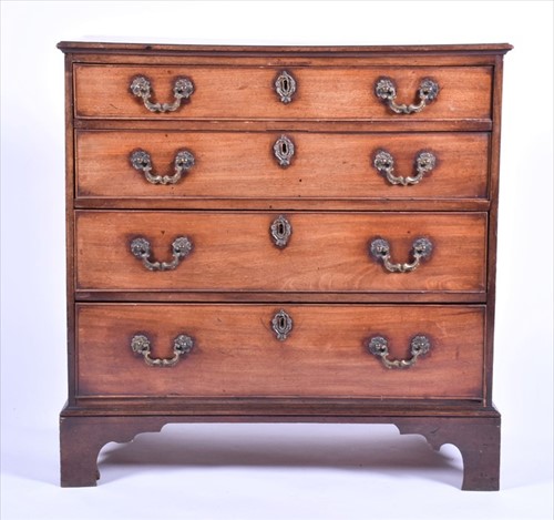 Lot 53 - A Georgian straight fronted mahogany chest of...