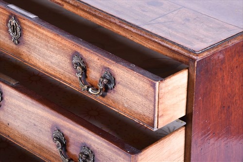 Lot 53 - A Georgian straight fronted mahogany chest of...