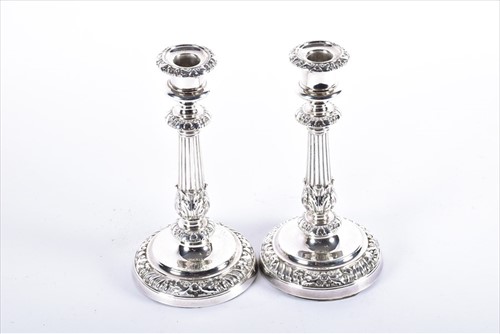 Lot 456 - A pair of George III silver candlesticks by...
