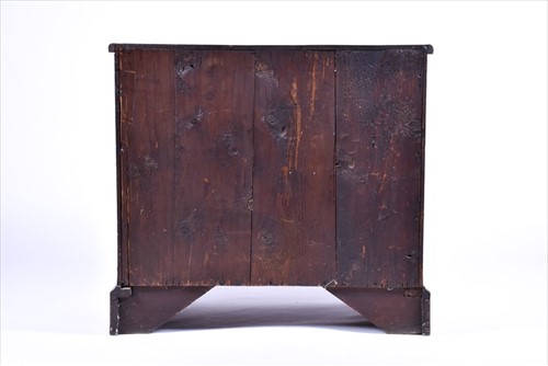 Lot 152 - A small Georgian straight fronted walnut chest...