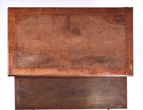 Lot 152 - A small Georgian straight fronted walnut chest...