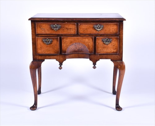 Lot 144 - A Queen Anne herring banded burr walnut lowboy...