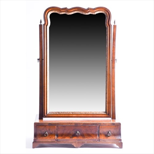 Lot 45 - A Queen Anne burr walnut dressing mirror the...