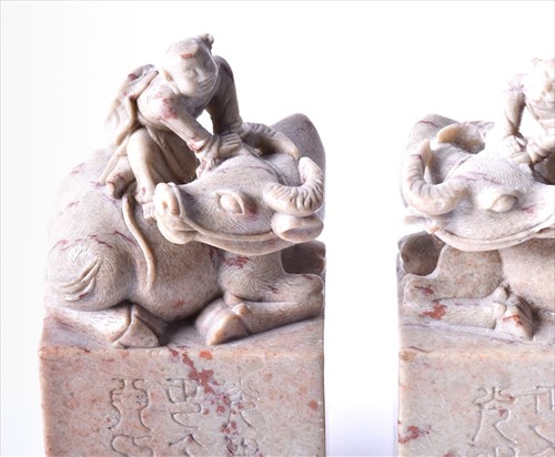 Lot 181 - A pair of Chinese carved soapstone seals each...