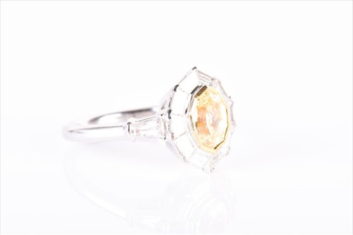 Lot 567 - An 18ct white gold, yellow and white diamond...