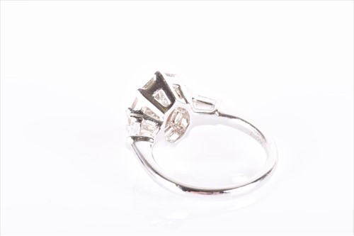 Lot 567 - An 18ct white gold, yellow and white diamond...