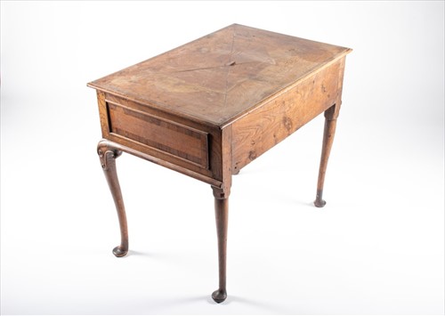 Lot 45 - A George III oak and inlaid low boy with...