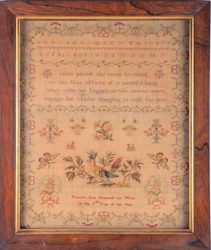 Lot 113 - A 19th century tapestry sampler completed by...