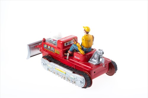 Lot 191 - A Japanese tinplate Magic Action Bulldozer in...