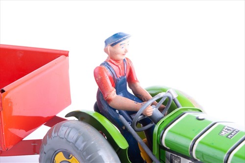 Lot 191 - A Japanese tinplate Magic Action Bulldozer in...