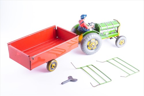 Lot 191 - A Japanese tinplate Magic Action Bulldozer in...