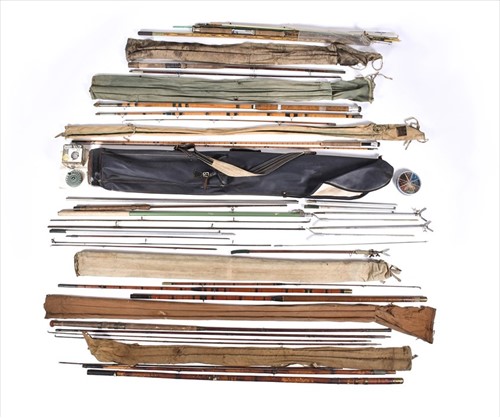 Lot 297 - A collection of assorted vintage fishing rods...