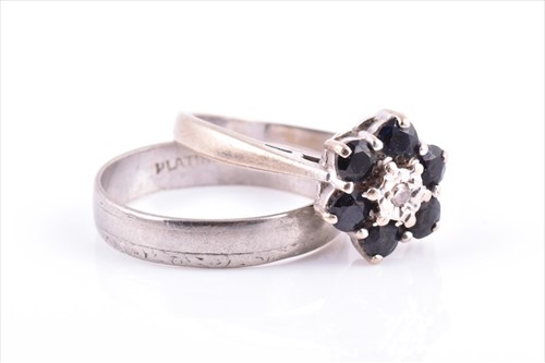 Lot 698 - An 18ct white gold and sapphire floral cluster...