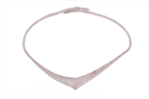 Lot 638 - Tiffany & Co. A silver mesh bib necklace with...