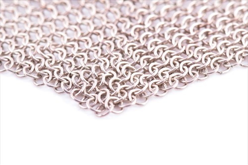 Lot 638 - Tiffany & Co. A silver mesh bib necklace with...