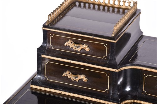 Lot 167 - An Aesthetic Movement ebonised desk with...