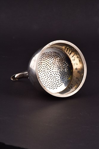 Lot 474 - A George III silver wine funnel London 1800,...