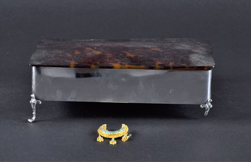 Lot 604 - A yellow metal and turquoise crescent brooch...