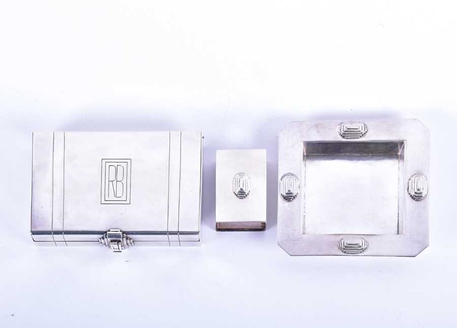 Lot 482 - A Charles Boyton Art Deco silver smoker's set...