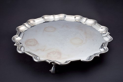 Lot 363 - An English silver footed salver with shaped...