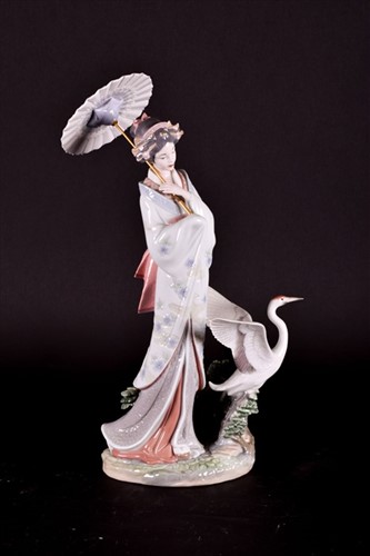 Lot 245 - A large Lladro porcelain model of a geisha...