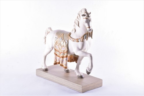 Lot 242 - A Lladro porcelain model of a regal steed...