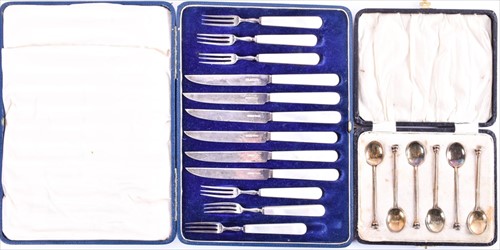 Lot 483 - A cased set of six silver gilt and guillochÃ©...