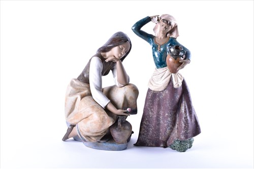 Lot 249 - Two large gres Lladro porcelain figures to...
