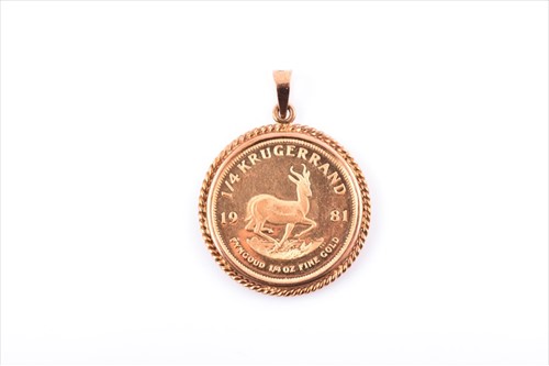 Lot 593 - A 9ct yellow gold mounted 1/4 South African...