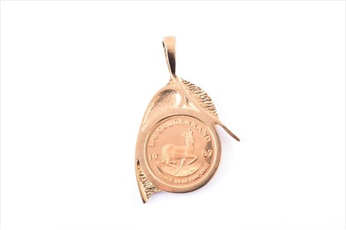 Lot 594 - A 9ct yellow gold mounted 1/4 South African...
