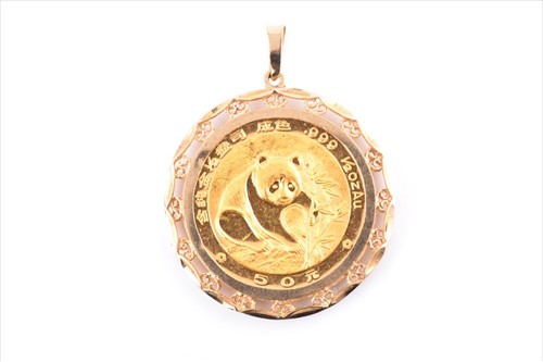Lot 588 - A 1988 Chinese 50 Yuan gold coin (1/2 oz of...