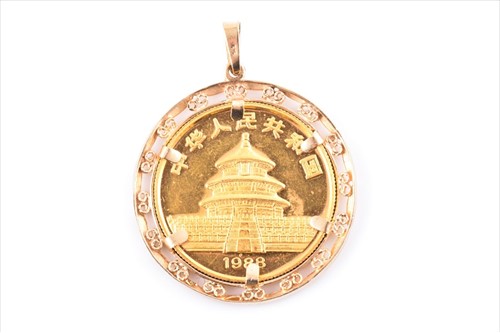 Lot 588 - A 1988 Chinese 50 Yuan gold coin (1/2 oz of...