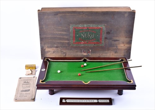 Lot 282 - A miniature boxed game of "Nuku" billiards by...