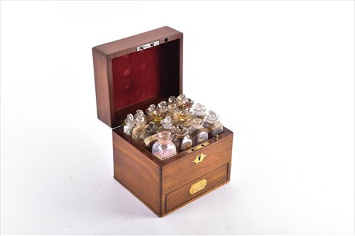 Lot 215 - A small 19th century mahogany cased medicine...