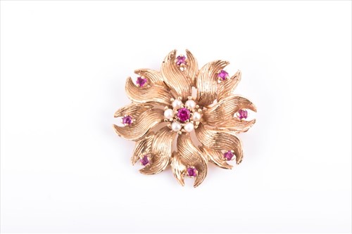 Lot 579 - A yellow metal ruby and pearl floral brooch...