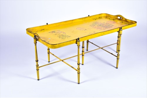 Lot 173 - A large rectangular toleware tray table on...